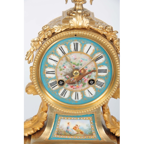 565 - A LATE 19TH CENTURY FRENCH ORMOLU AND PORCELAIN PANELLED MANTEL CLOCK the case surmounted by a flora... 