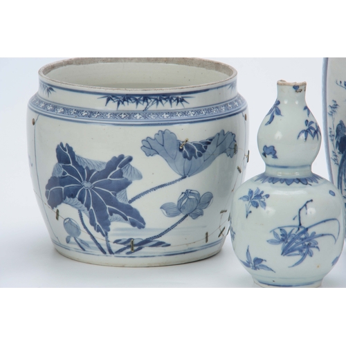 104 - A COLLECTION OF 18TH - 19TH CENTURY CHINESE BLUE AND WHITE PORCELAIN VASES the smaller with a later ... 
