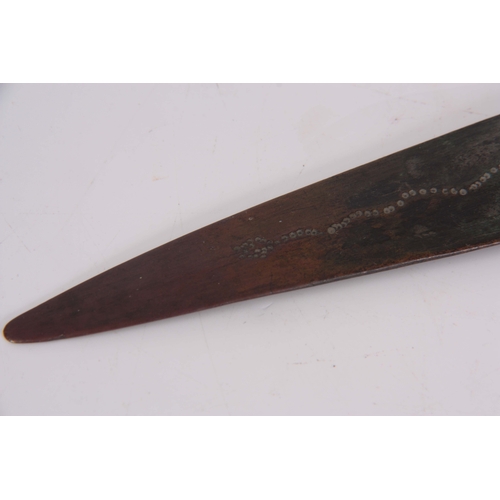 306 - AN EARLY ROMAN / MEDIEVAL BRONZE SPEARHEAD with punched decoration 30.5cm overall.