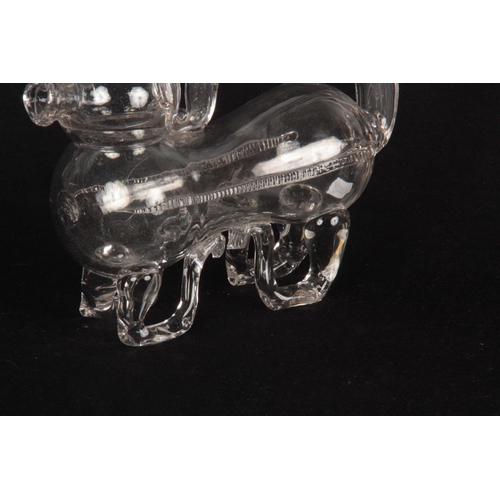 6 - AN UNUSUAL 19TH/20TH CENTURY CLEAR GLASS DECANTER modelled as a dog, 23cm across 18cm high