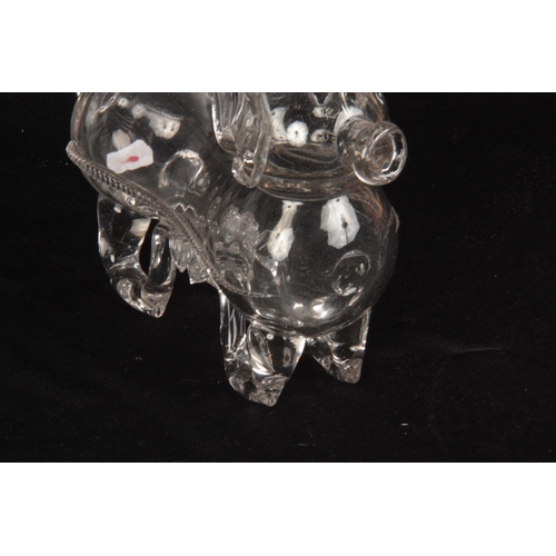 6 - AN UNUSUAL 19TH/20TH CENTURY CLEAR GLASS DECANTER modelled as a dog, 23cm across 18cm high