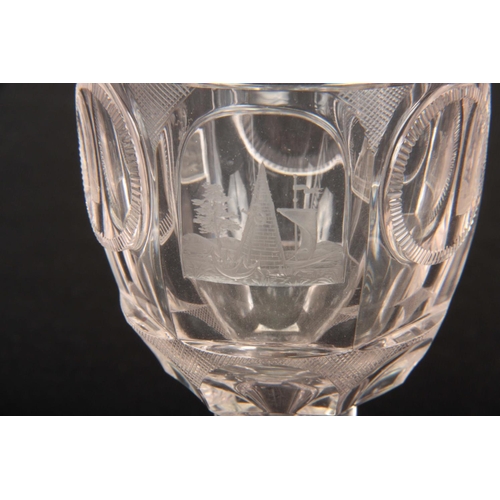 8 - A 19TH CENTURY EUROPEAN GLASS GOBLET with petal-shaped star cut base on a hexagonal stem and facette... 