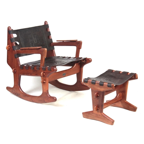 A 20TH CENTURY TEAK ROCKING CHAIR AND FOOTSTOOL BY ANGEL PAZMINO