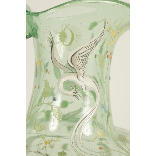 10 - AN 18TH/19TH CENTURY CONTINENTAL PALE GREEN GLASS EWER with broad foot and squat bulbous body beneat... 