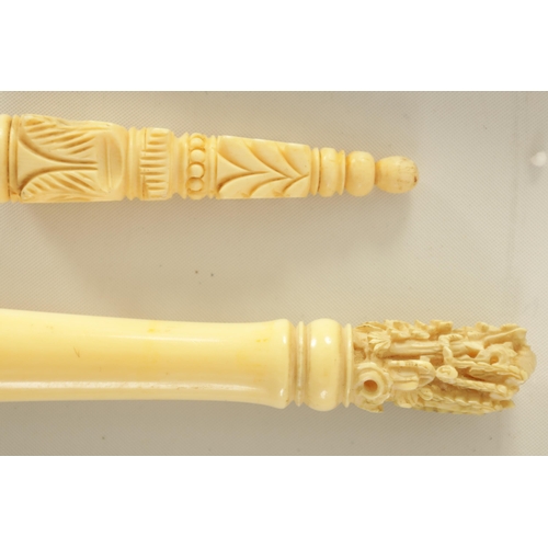 107 - A COLLECTION OF TEN 19TH CENTURY CARVED IVORY PARASOL HANDLES (34cm and smaller)