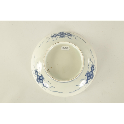 112 - A JAPANESE EDO PERIOD BLUE AND WHITE PORCELAIN DISH with lily spray decoration (20.5cm diameter )