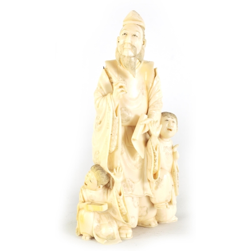 114 - A JAPANESE MEIJI PERIOD CARVED IVORY FIGURE GROUP depicting a scholar with two children - signed ben... 