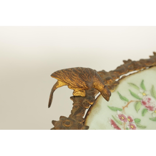 117 - A PAIR OF 19TH CENTURY CHINESE CANTON FAMILLE VERTE DISHES with floral, bird and butterfly decoratio... 