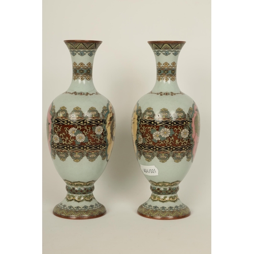 122 - A PAIR OF MEIJI PERIOD JAPANESE CLOISONNE VASES of footed baluster form with oval pink panels of exo... 