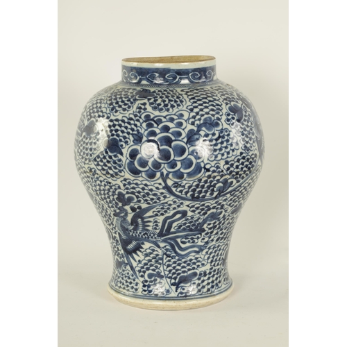 123 - AN 18TH CENTURY CHINESE BLUE AND WHITE BULBOUS VASE decorated with a continuous band of flowers. (34... 