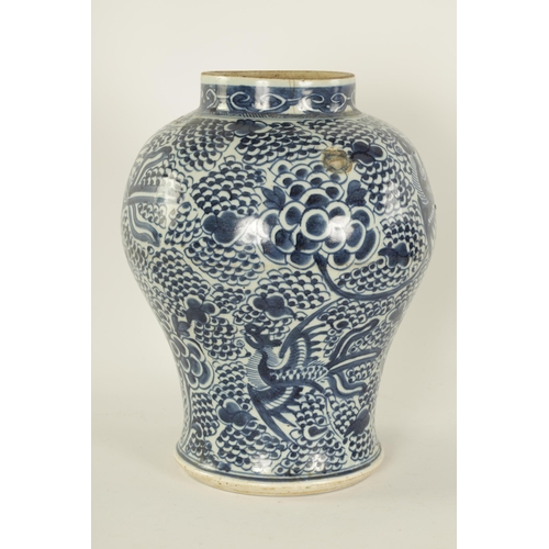 123 - AN 18TH CENTURY CHINESE BLUE AND WHITE BULBOUS VASE decorated with a continuous band of flowers. (34... 