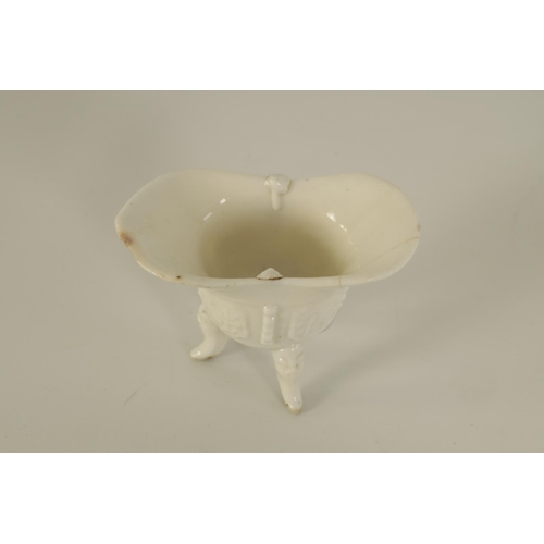 125 - AN 18TH/19TH CENTURY CHINESE BLANC DE CHINE MINIATURE SAUCE BOAT with side handle and double lipped ... 