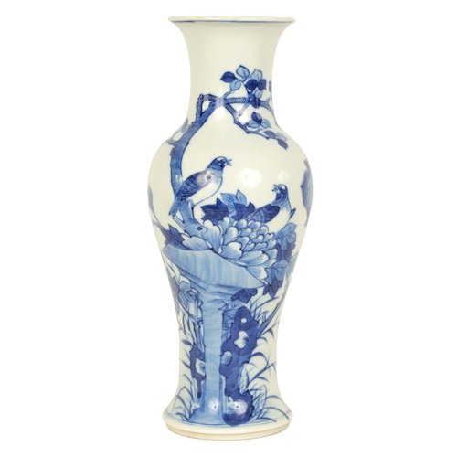 126 - AN 18TH/19TH CENTURY CHINESE BLUE AND WHITE VASE of slender baluster form decorated with birds among... 