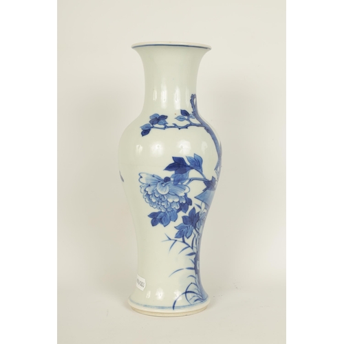 126 - AN 18TH/19TH CENTURY CHINESE BLUE AND WHITE VASE of slender baluster form decorated with birds among... 