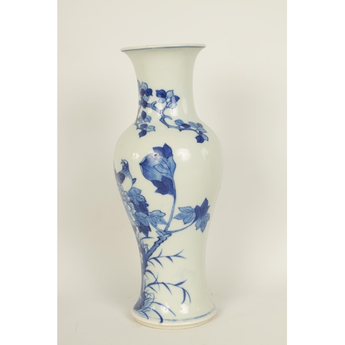 126 - AN 18TH/19TH CENTURY CHINESE BLUE AND WHITE VASE of slender baluster form decorated with birds among... 