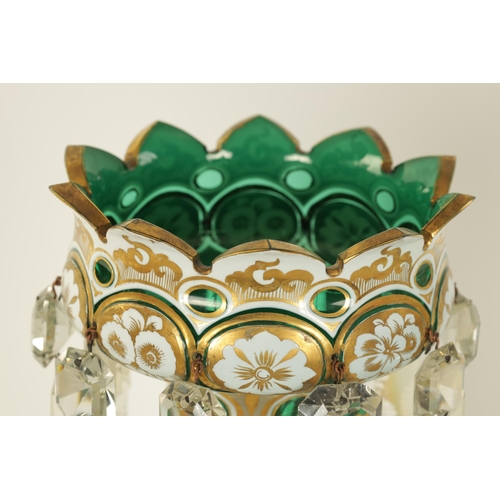 13 - A FINE PAIR OF 19TH CENTURY BOHEMIAN GREEN AND WHITE OVERLAY GLASS LUSTRES with gilt and floral pain... 