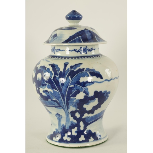 130 - AN EARLY 19TH CENTURY CHINESE BLUE AND WHITE BALUSTER VASE AND COVER decorated with figures in a gar... 