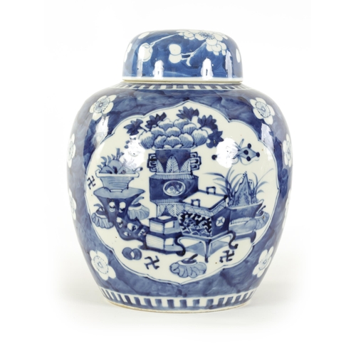 132 - AN EARLY 19TH CENTURY CHINESE LARGE BLUE AND WHITE GINGER JAR AND COVER with prunus blossom decorati... 