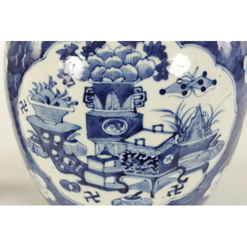 132 - AN EARLY 19TH CENTURY CHINESE LARGE BLUE AND WHITE GINGER JAR AND COVER with prunus blossom decorati... 