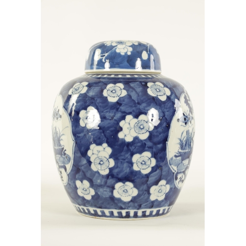 132 - AN EARLY 19TH CENTURY CHINESE LARGE BLUE AND WHITE GINGER JAR AND COVER with prunus blossom decorati... 