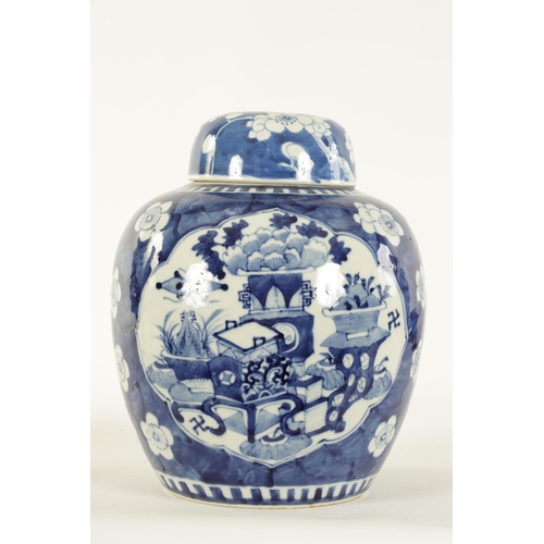 132 - AN EARLY 19TH CENTURY CHINESE LARGE BLUE AND WHITE GINGER JAR AND COVER with prunus blossom decorati... 