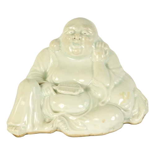 133 - AN EARLY 20TH CENTURY BLANC DE CHINE FIGURE OF A SEATED BUDDHA late Qing period. (23.5cm wide 17cm h... 