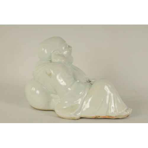 133 - AN EARLY 20TH CENTURY BLANC DE CHINE FIGURE OF A SEATED BUDDHA late Qing period. (23.5cm wide 17cm h... 