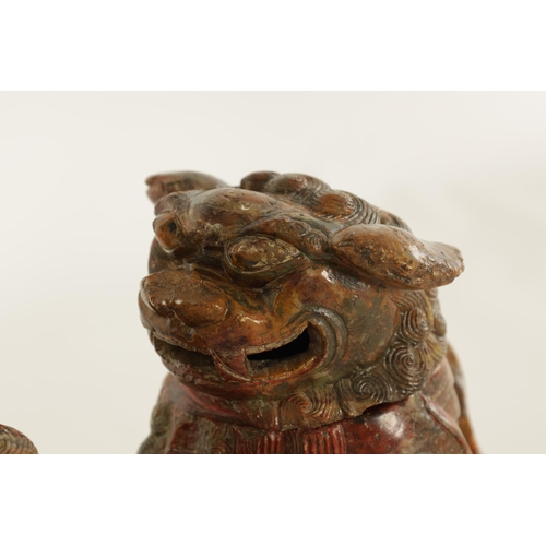 135 - AN EARLY CHINESE CARVED SOAPSTONE SCULPTURE OF A LIDDED FOO DOG finely carved and with lift-off head... 