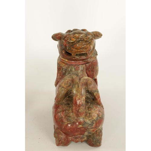 135 - AN EARLY CHINESE CARVED SOAPSTONE SCULPTURE OF A LIDDED FOO DOG finely carved and with lift-off head... 