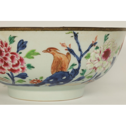 136 - TWO 18TH CENTURY CHINESE FAMILLE ROSE PORCELAIN BOWLS decorated with colourful chrysanthemum and oth... 