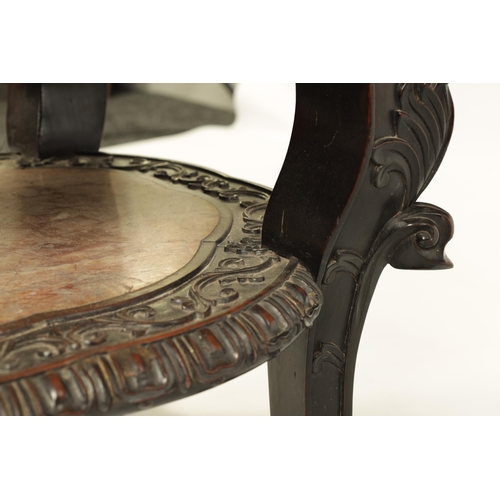 139 - A 19TH CENTURY CHINESE HARDWOOD JARDINIERE STAND with circular marble top above a carved pierced fri... 