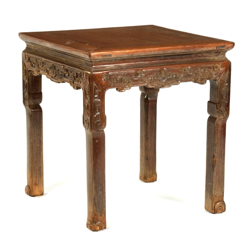 140 - A 19TH CENTURY CHINESE HARDWOOD SQUARE OCCASIONAL TABLE with panelled top joined by carved rails, st... 