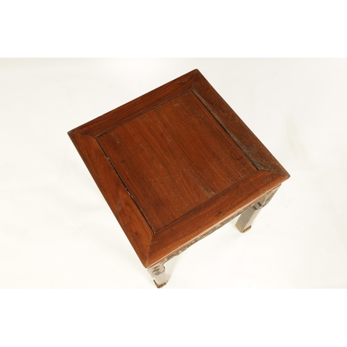 140 - A 19TH CENTURY CHINESE HARDWOOD SQUARE OCCASIONAL TABLE with panelled top joined by carved rails, st... 