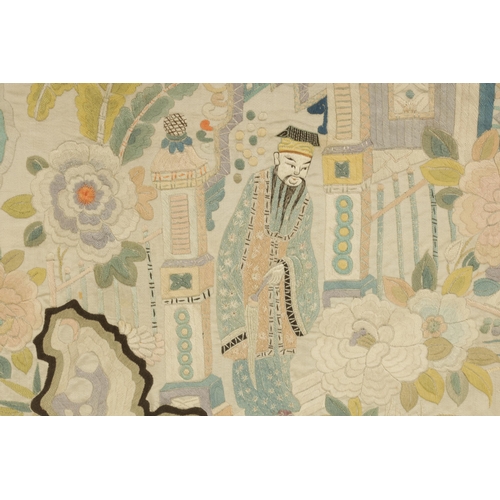 144 - A FINE 19TH CENTURY CHINESE EMBROIDERED SILK PANEL decorated with figures in a garden setting with f... 