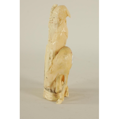 145 - A FINELY CARVED CHINESE IVORY SCULPTURE depicting a sage with a young child and a deer - signed to t... 