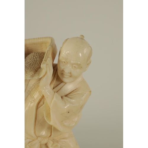 147 - A JAPANESE MEIJI PERIOD CARVED IVORY FIGURE depicting a farmer pouring grain. (14cm high )