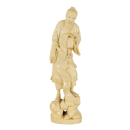 156 - A 19TH CENTURY CHINESE CARVED IVORY FIGURE depicting a scholar with a scroll - signed beneath. (22cm... 