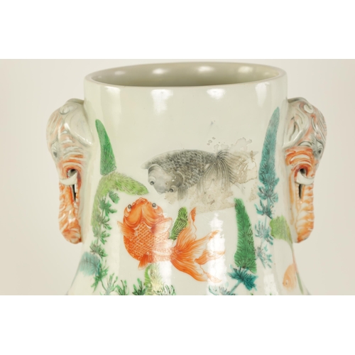 157 - A 19TH CENTURY CHINESE FAMILLE VERTE PORCELAIN VASE decorated with carp amongst seaweed - having sle... 