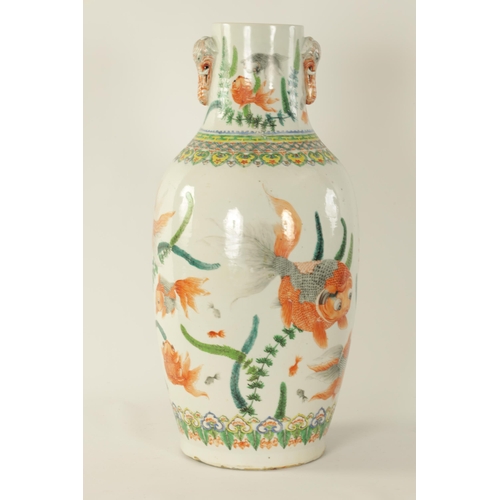 157 - A 19TH CENTURY CHINESE FAMILLE VERTE PORCELAIN VASE decorated with carp amongst seaweed - having sle... 