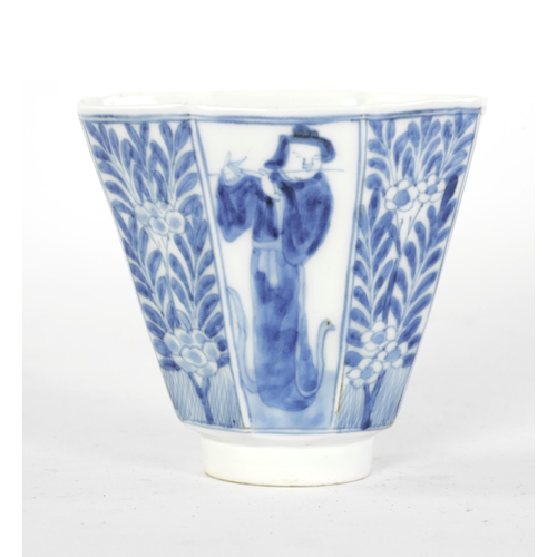 165 - AN 18TH CENTURY CHINESE KANGXI PERIOD BLUE AND WHITE PORCELAIN WINE CUP of octagonal tapering form r... 