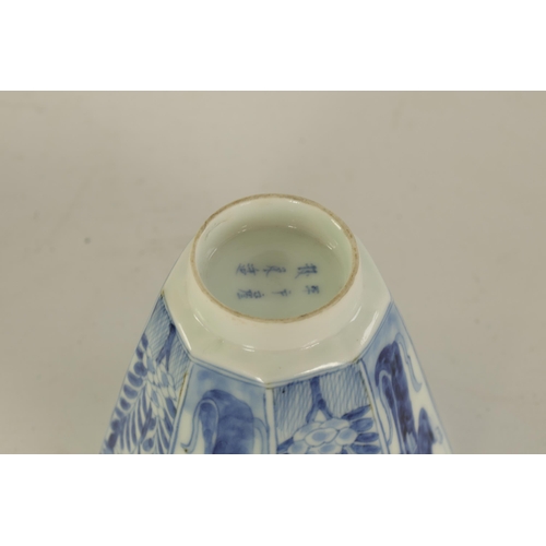 165 - AN 18TH CENTURY CHINESE KANGXI PERIOD BLUE AND WHITE PORCELAIN WINE CUP of octagonal tapering form r... 