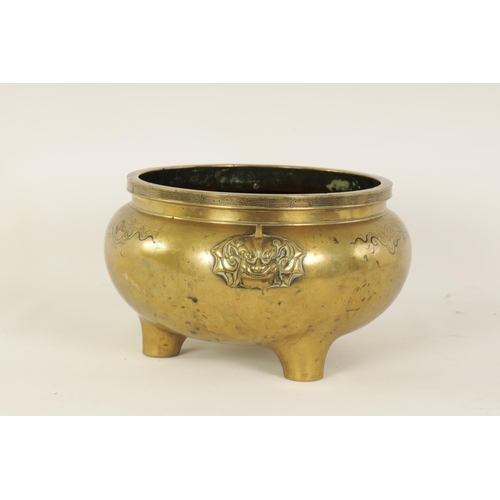 167 - AN OVERSIZED 18TH/19TH CENTURY CHINESE CAST BRONZE CENSER with inlaid decoration and foo dog mask si... 