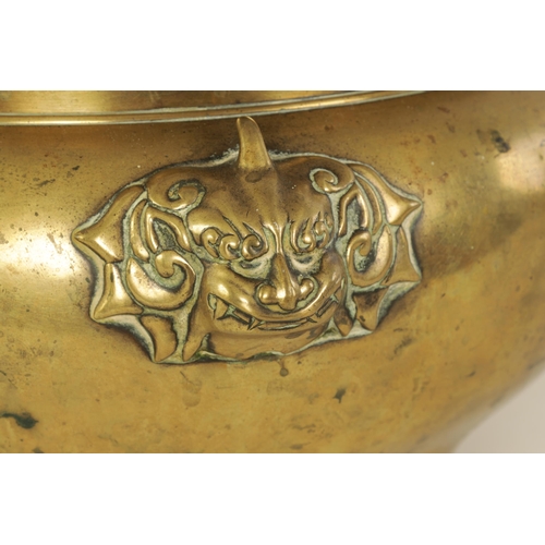 167 - AN OVERSIZED 18TH/19TH CENTURY CHINESE CAST BRONZE CENSER with inlaid decoration and foo dog mask si... 