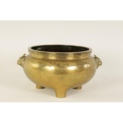 167 - AN OVERSIZED 18TH/19TH CENTURY CHINESE CAST BRONZE CENSER with inlaid decoration and foo dog mask si... 