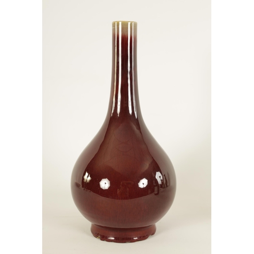 169 - A 19TH CENTURY QING DYNASTY SANG DE BOEUF BOTTLE NECK VASE of large size (37cm high)