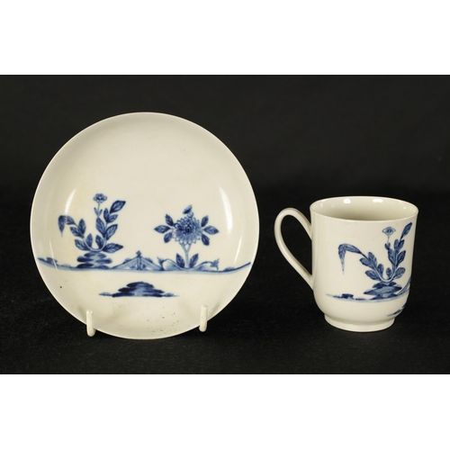 17 - AN 18TH CENTURY WORCESTER TYPE BLUE AND WHITE TEA CUP AND SAUCER with Oriental garden decoration. (1... 