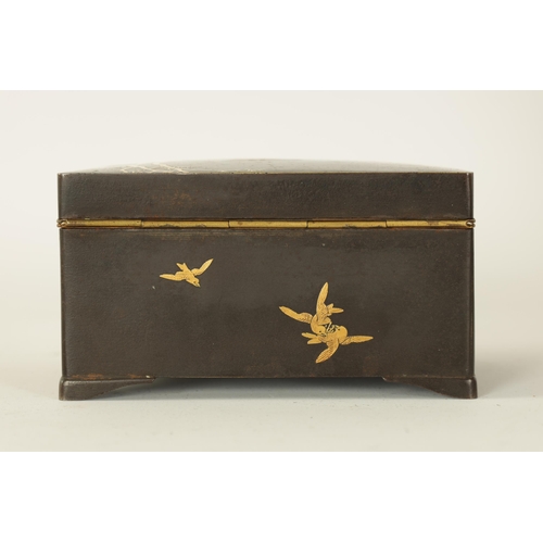 173 - A JAPANESE MEIJI PERIOD GILT METAL IRON WORK BOX decorated with a stag under trees to the lid, the s... 