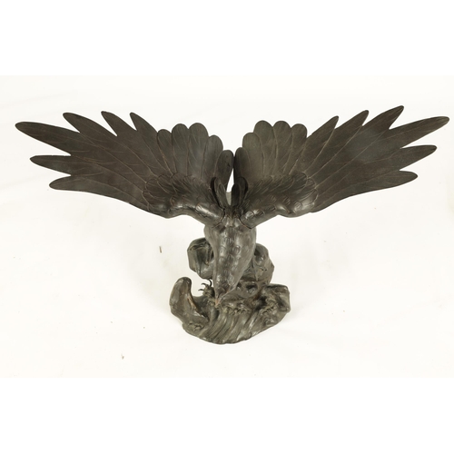 181 - A 19TH CENTURY CHINESE PATINATED BRONZE SCULPTURE OF AN EAGLE perched on a naturalistic stumpwork ba... 