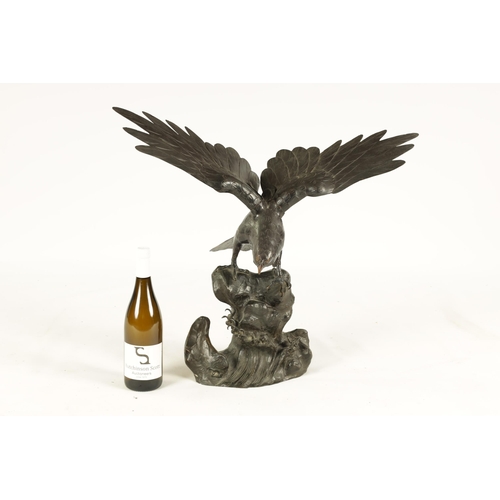 181 - A 19TH CENTURY CHINESE PATINATED BRONZE SCULPTURE OF AN EAGLE perched on a naturalistic stumpwork ba... 