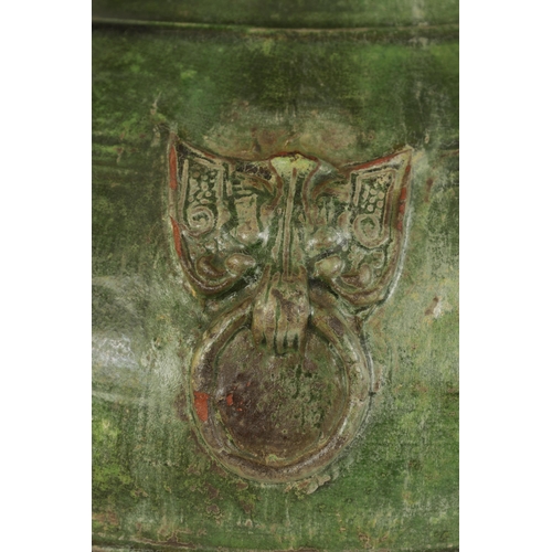 182 - A CHINESE HAN DYNASTY GREEN GLAZED POTTERY HU VASE with masked side mounts and ringed decoration - s... 